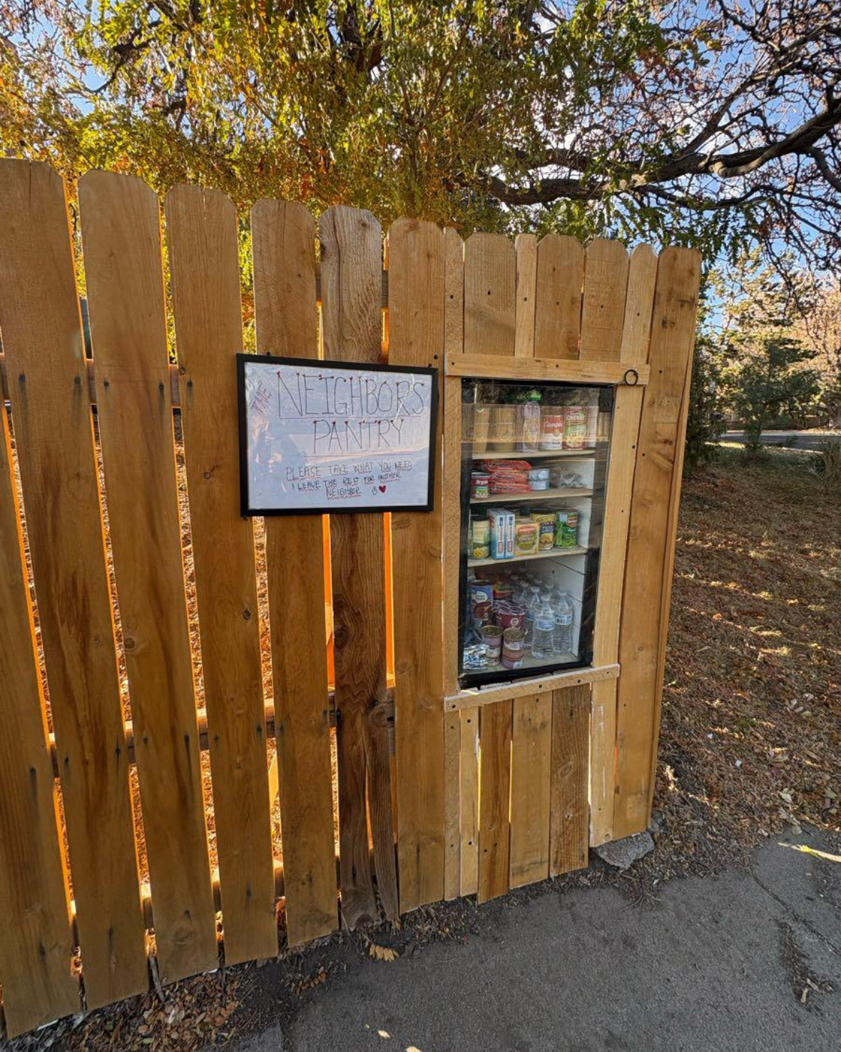 The Neighbor's Pantry on the fence